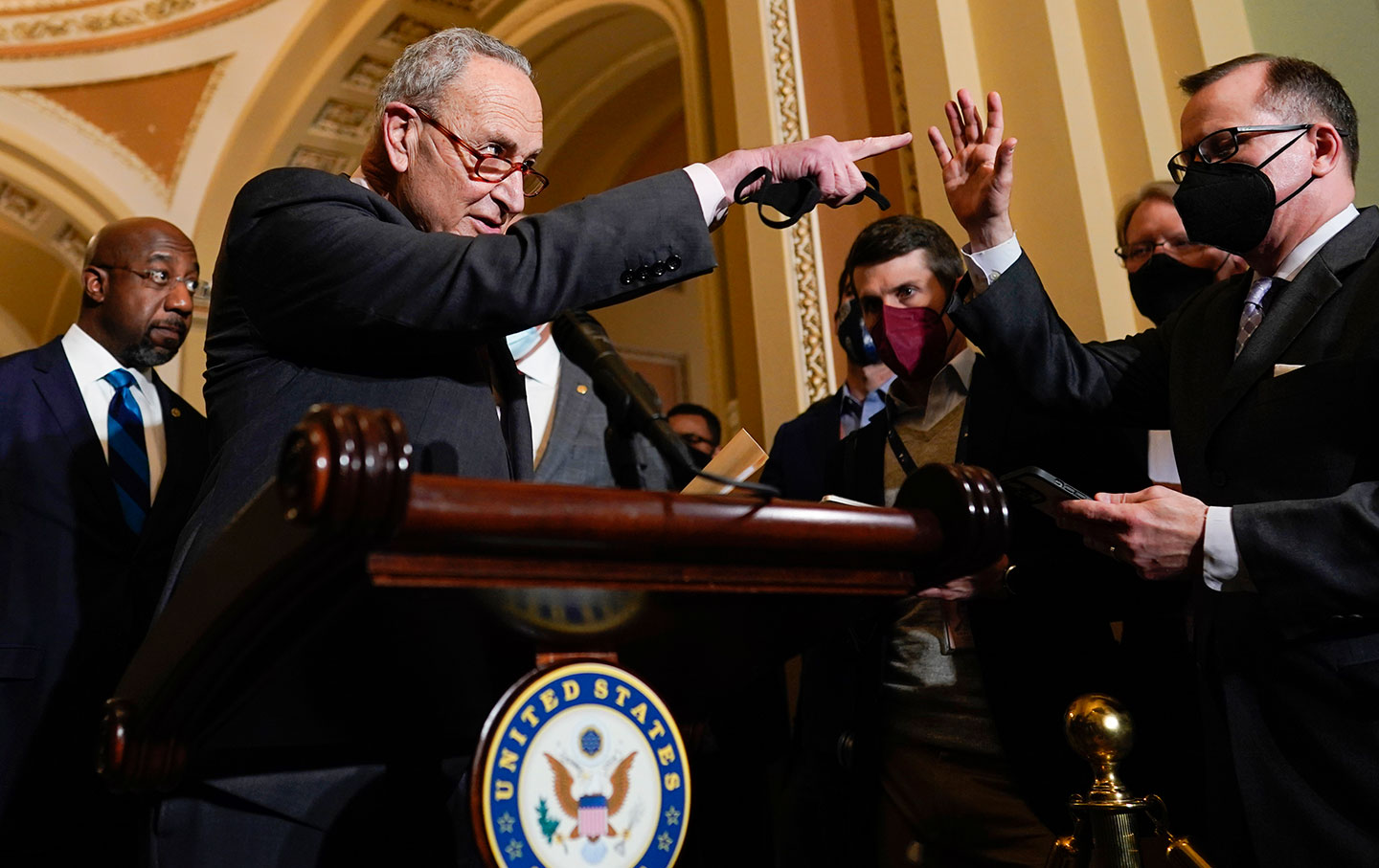 Sens. Chuck Schumer and Raphael Warnock