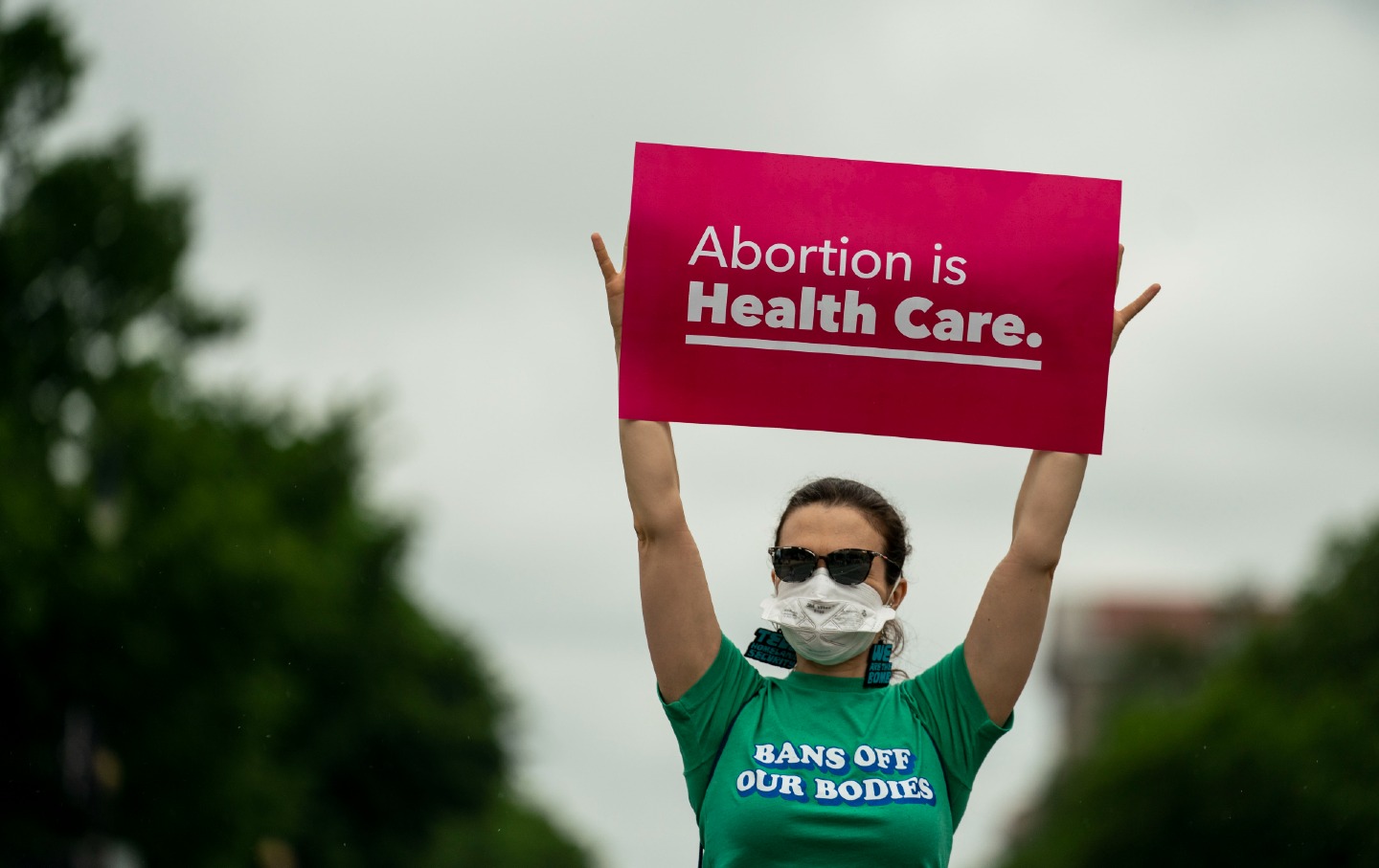 Abortion rights activist holding sign