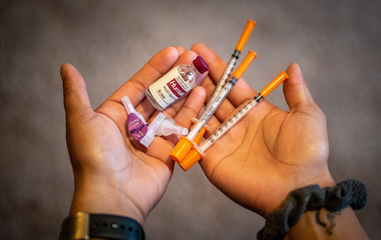 Alexis Stanley holds her insulin kit in her hands.