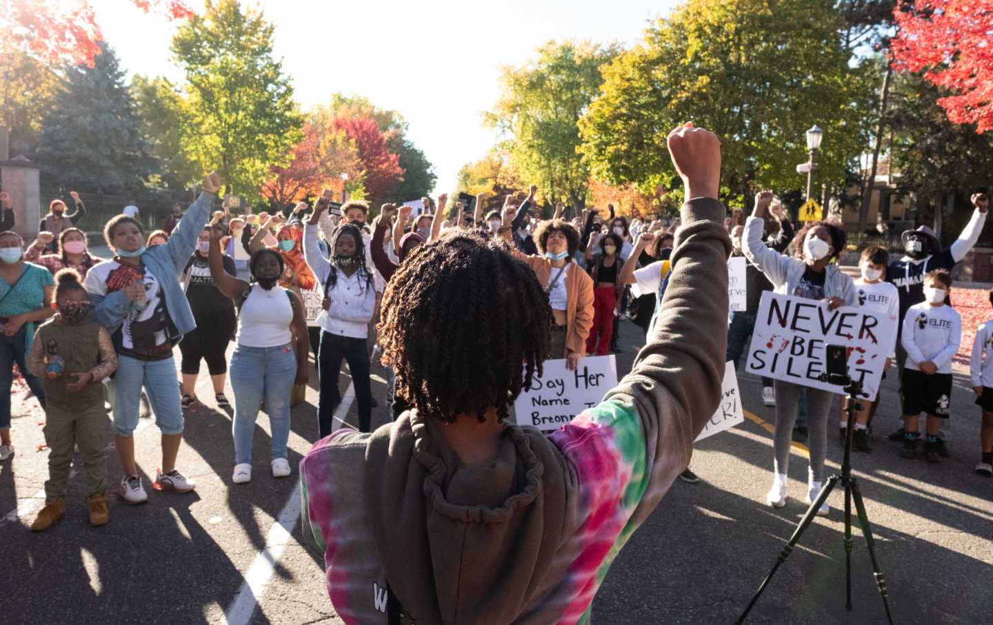 Protesters hold up their fists at a Black Lives Matter march in St Paul, Minnesota.