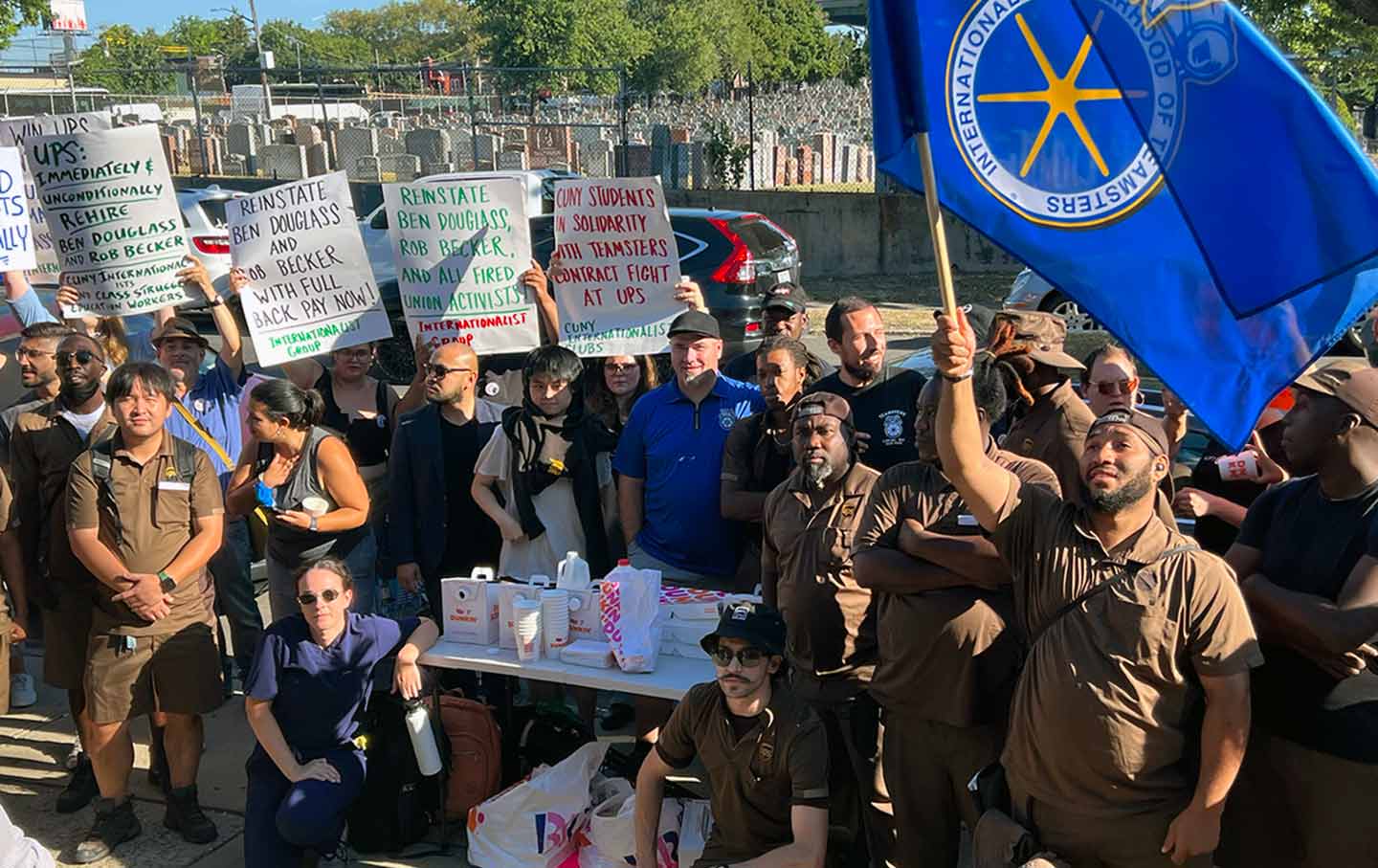 UPS workers in their brown uniforms rally