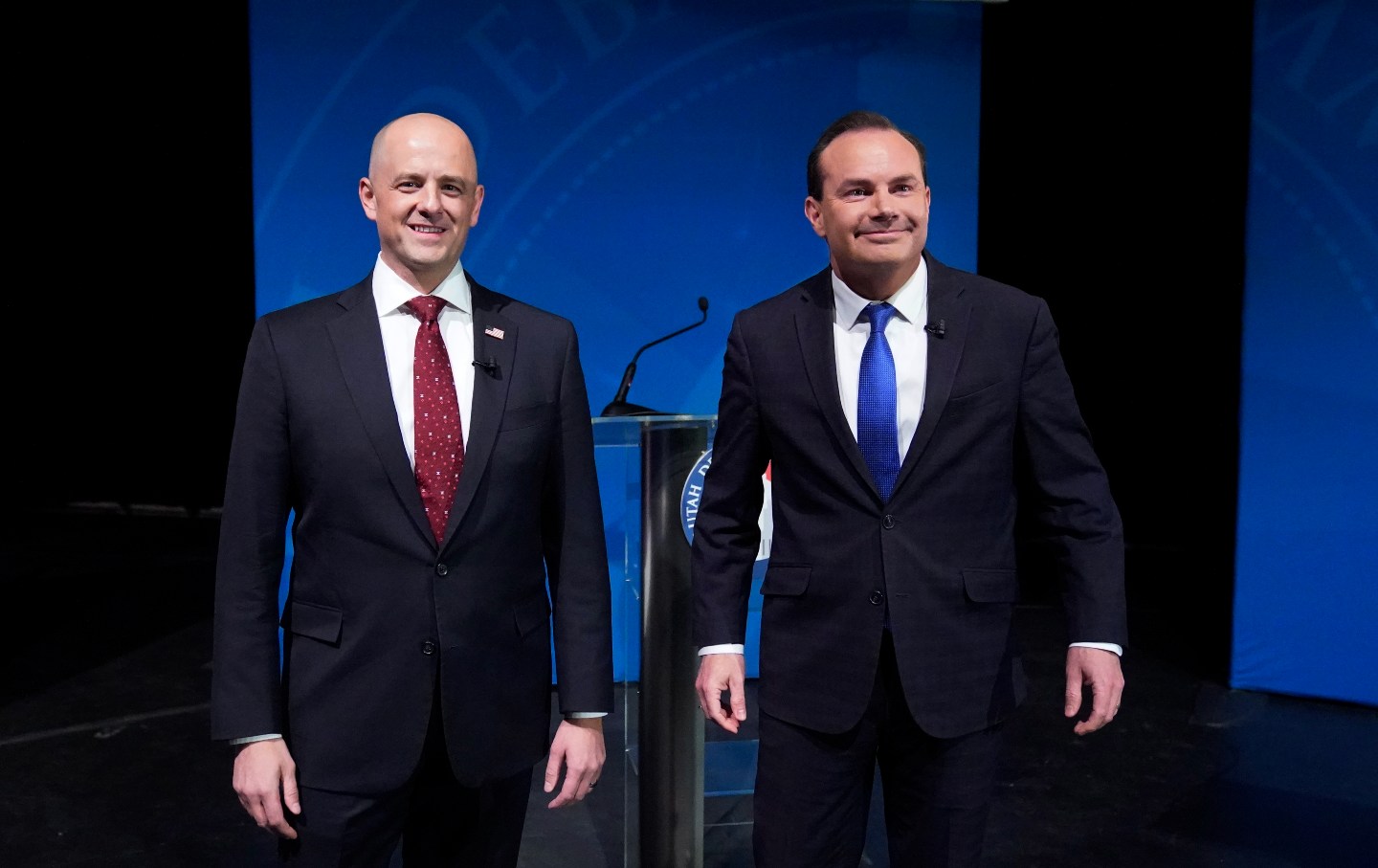 Utah Senator Mike Lee and independent challenger Evan McMullin stand together before their televised debate.