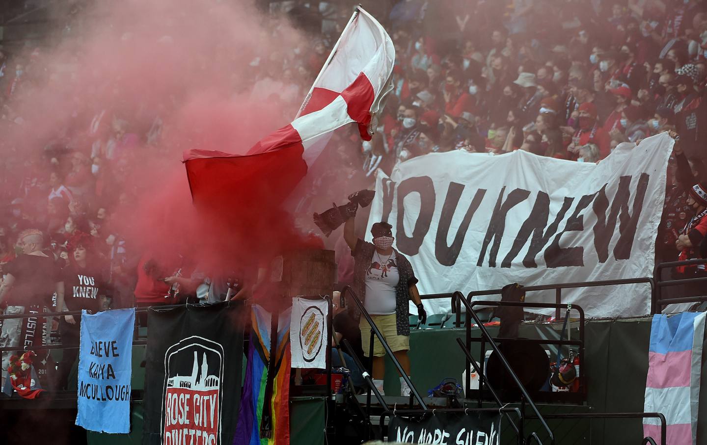 Portland Thorns women's soccer fans light a smoke bomb as part of a protest of the sex scandal in the National Women's Soccer League during a Thorns game against the Chicago Red Stars at Providence Park on November 14, 2021, in Portland, Oregon.
