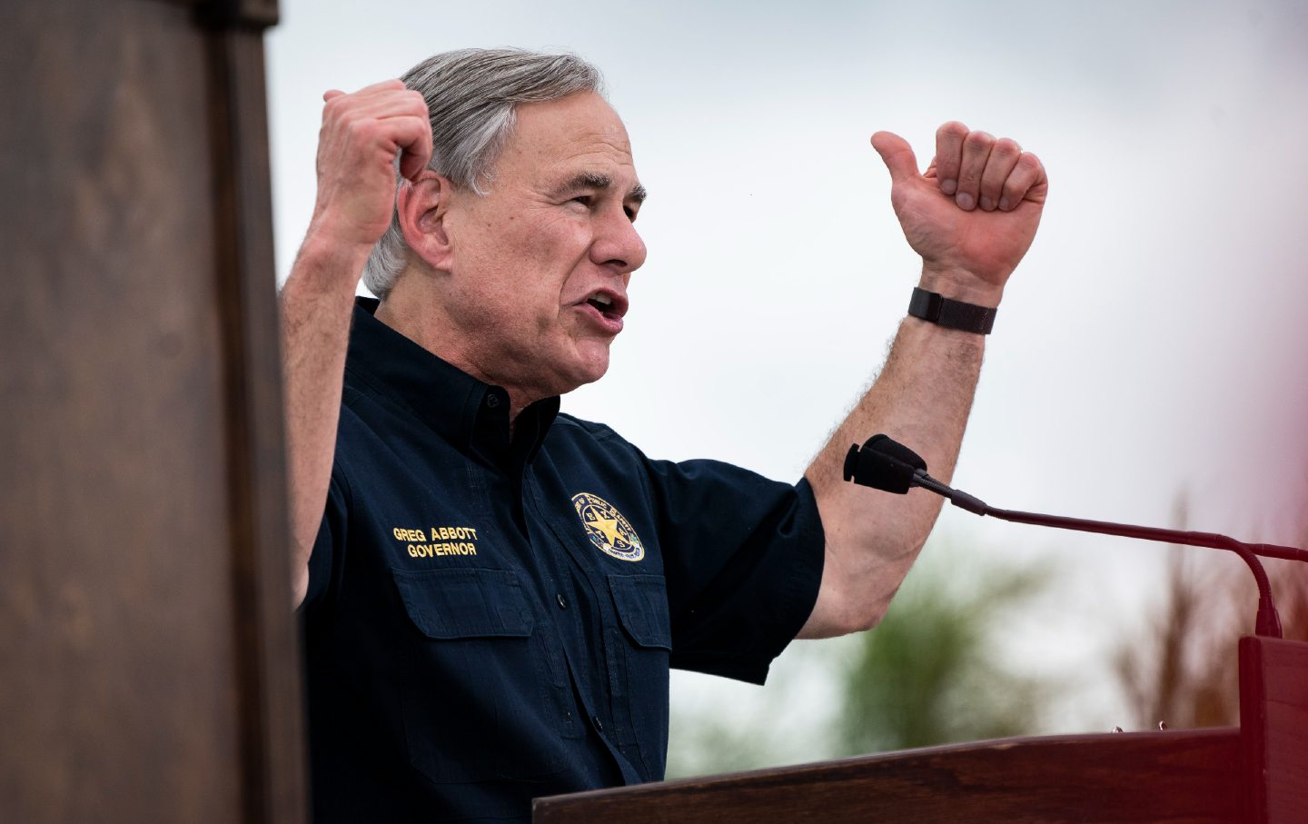 Governor Greg Abbott speaking with former President Donald Trump during a June 2021 tour of the US-Mexico border wall.