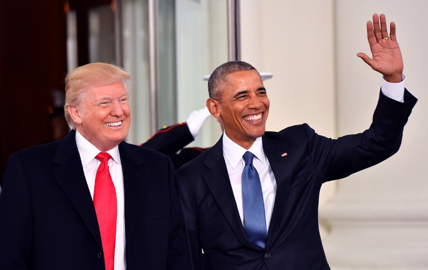 President Barack Obama and then-President-elect Donald Trump smile before the 2017 inauguration.