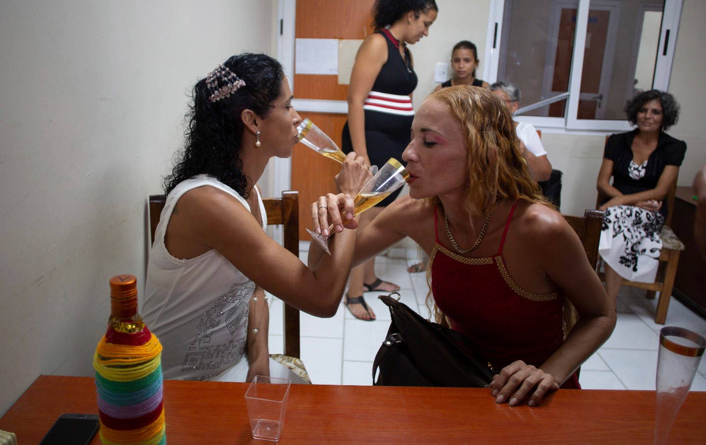 A lesbian couple toasts to their marriage in Santa Clara, Cuba