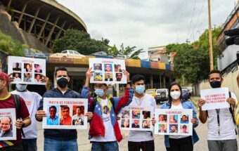 Relatives of political prisoners protest outside El Helicoide in Venezuela.