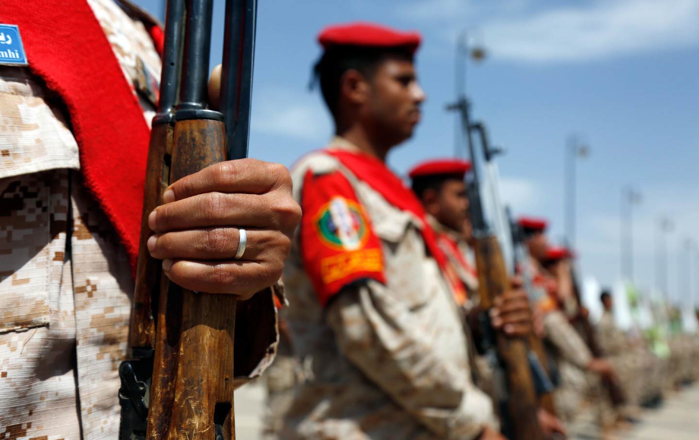 Houthi soldiers marching at funeral