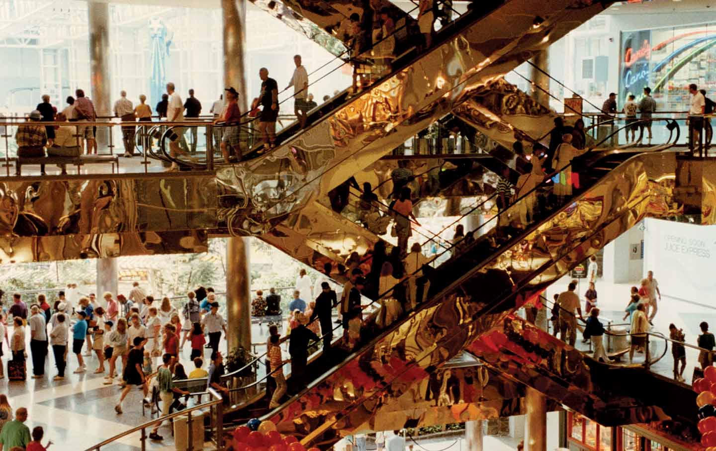 Looking down on shoppers interior of London shopping mall at