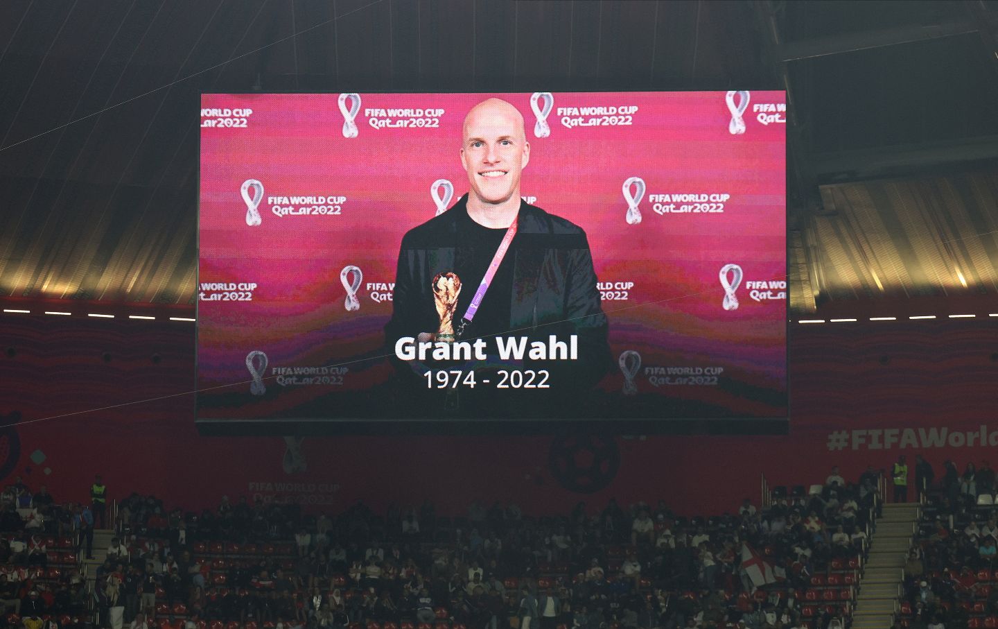 A picture of US journalist Grant Wahl projected on screen announcing his death during the England versus France World Cup quarter final match in Al Khor, Qatar.