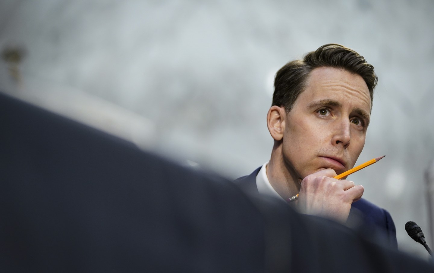 Senator Josh Hawley, Republican from Missouri, holding a pencil.