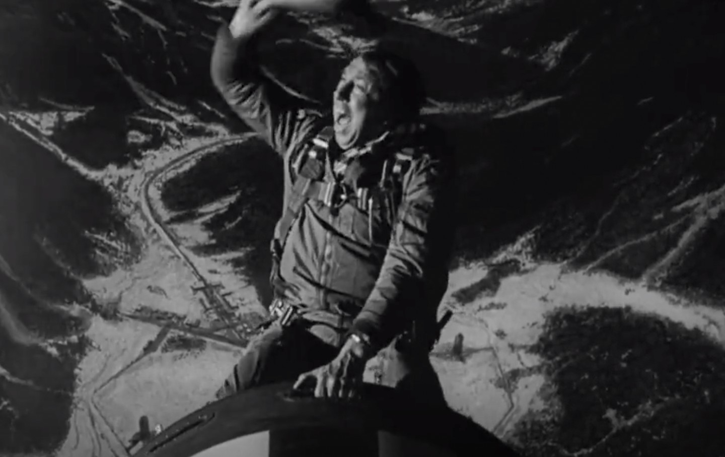 Actor Slim Pickens rides the bomb, waving his cowboy hat.