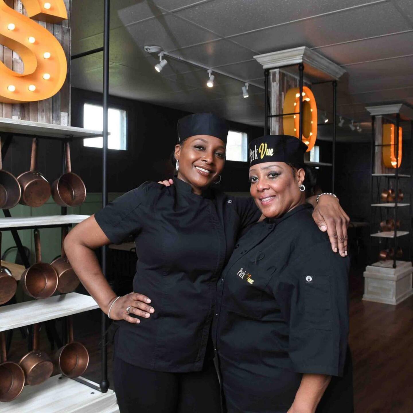 Harrita West (l.) and Schenita Williams (r.), daughter-mother co-owners, inside the dining room at Park Vue Soul Food Restaurant in Buffalo.