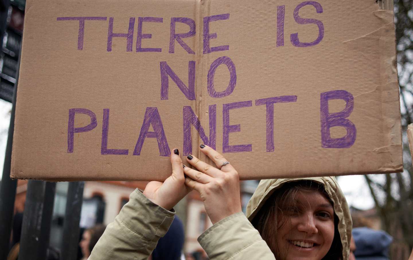 A demonstrator in Toulouse, France, denounces government inaction in the wake of the latest IPCC report on the climate crisis