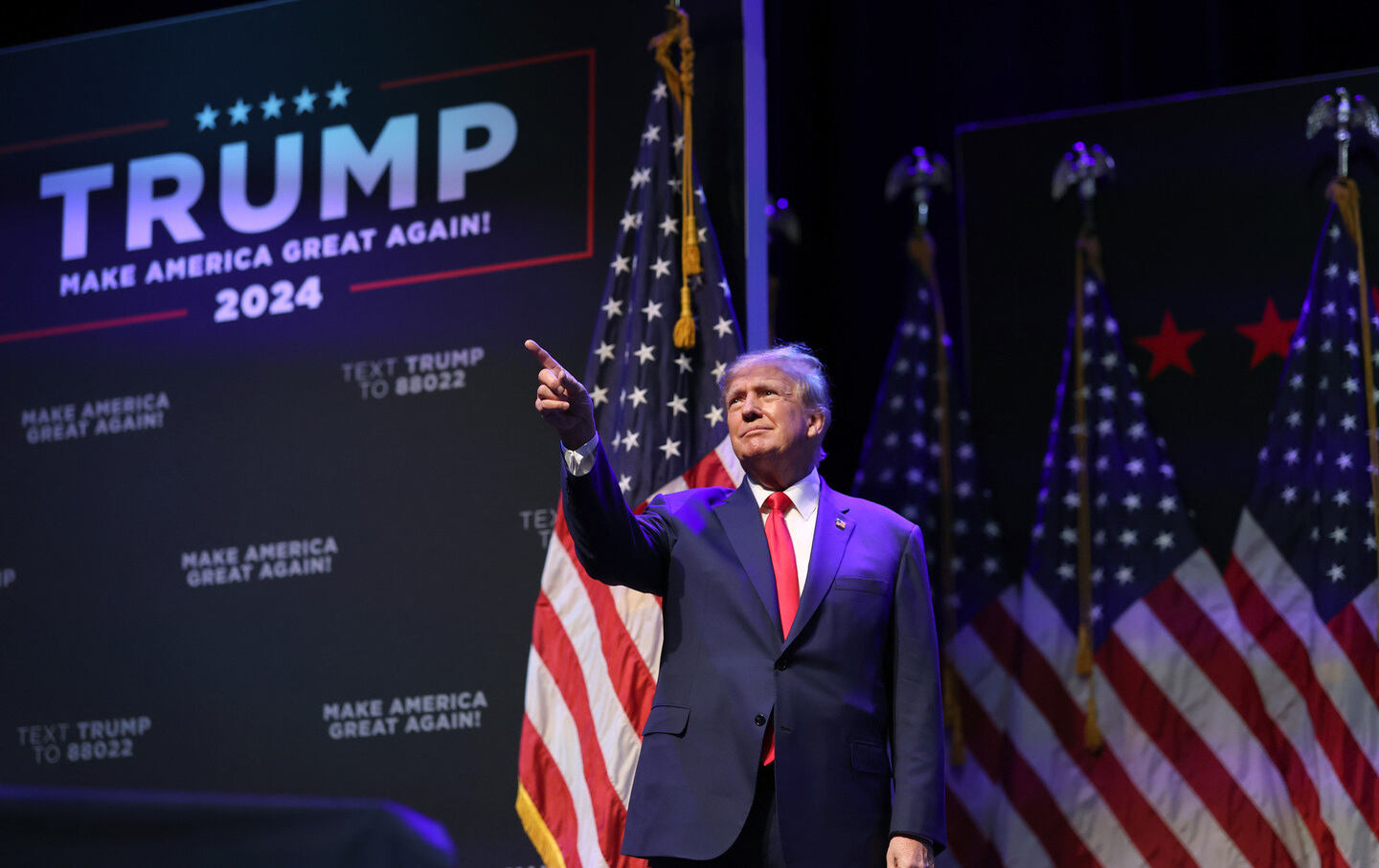 Former president Donald Trump arrives for an event at the Adler Theatre on March 13, 2023, in Davenport, Iowa.