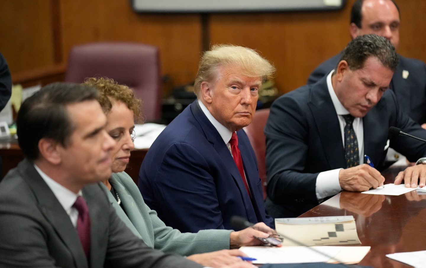 Former US President Donald Trump appears in a Manhattan court during his arraignment on April 4, 2023, in New York City.