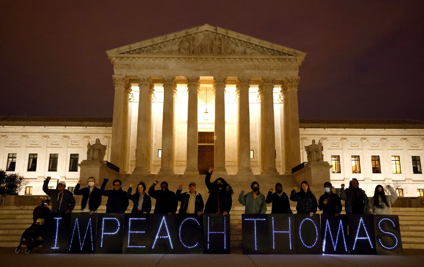 MoveOn activists call for the impeachment of Justice Clarence Thomas outside of the US Supreme Court Building