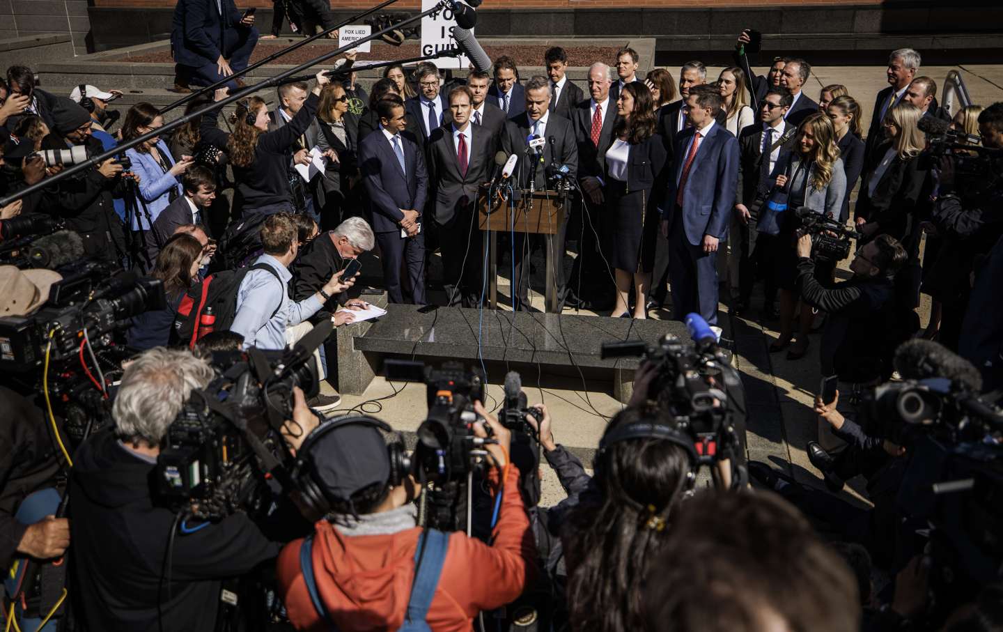 John Poulos, chief executive officer of Dominion Voting Systems, speaks during a news conference