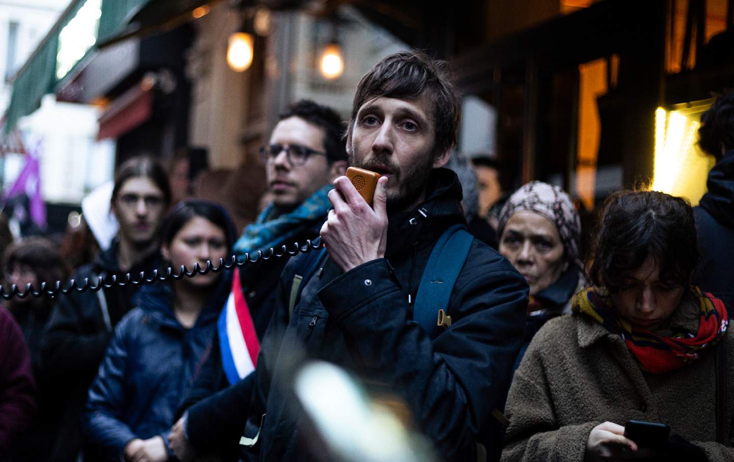 A group of people protested in front of the British Embassy, in Paris, to demand the release of Ernest Moret, on April 18, 2023 in Paris, France. The french publisher was taken into custody when he arrived in London to attended to a book fair. (Photo by Telmo Pinto/NurPhoto via AP)