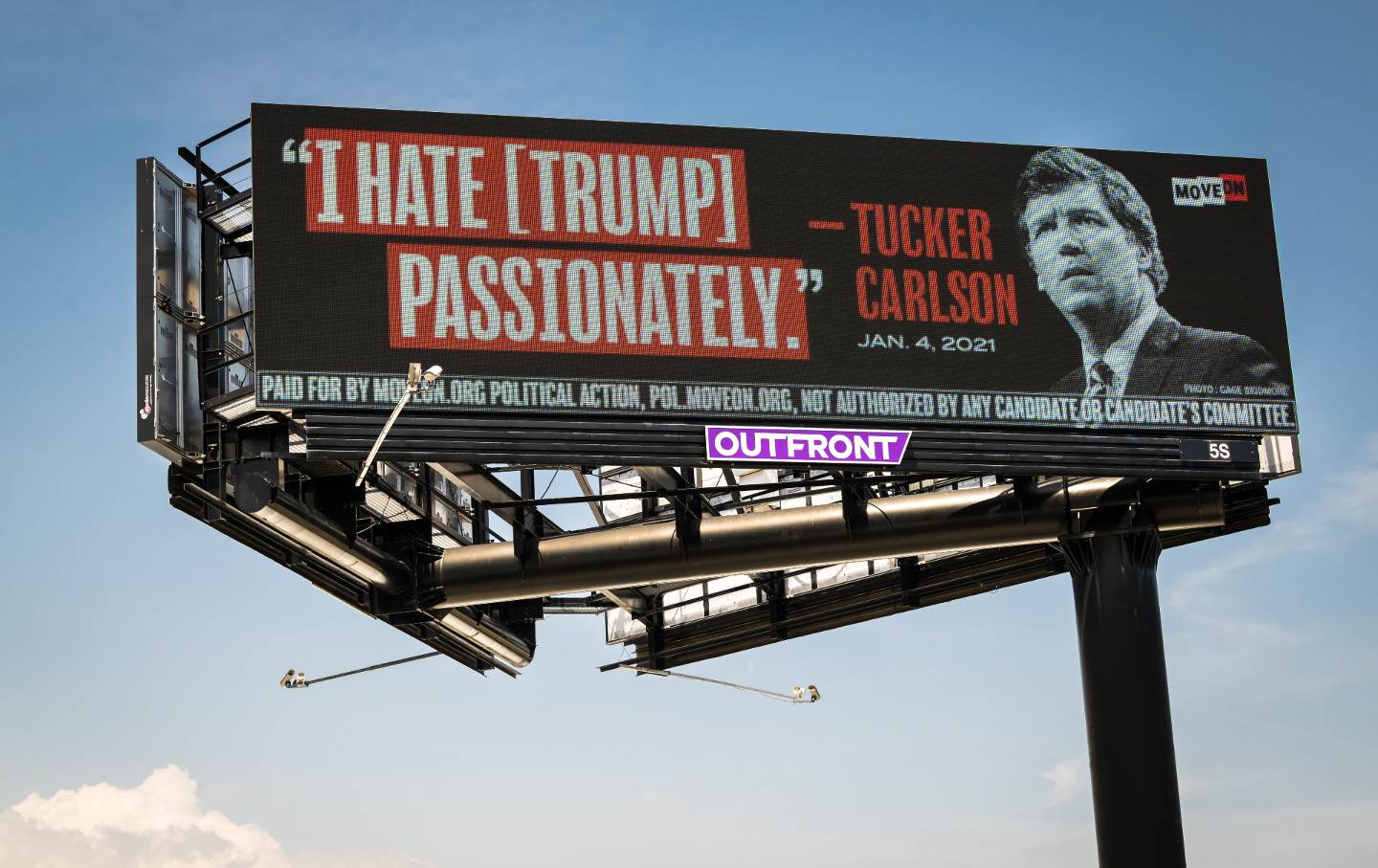 A digital billboard reads 