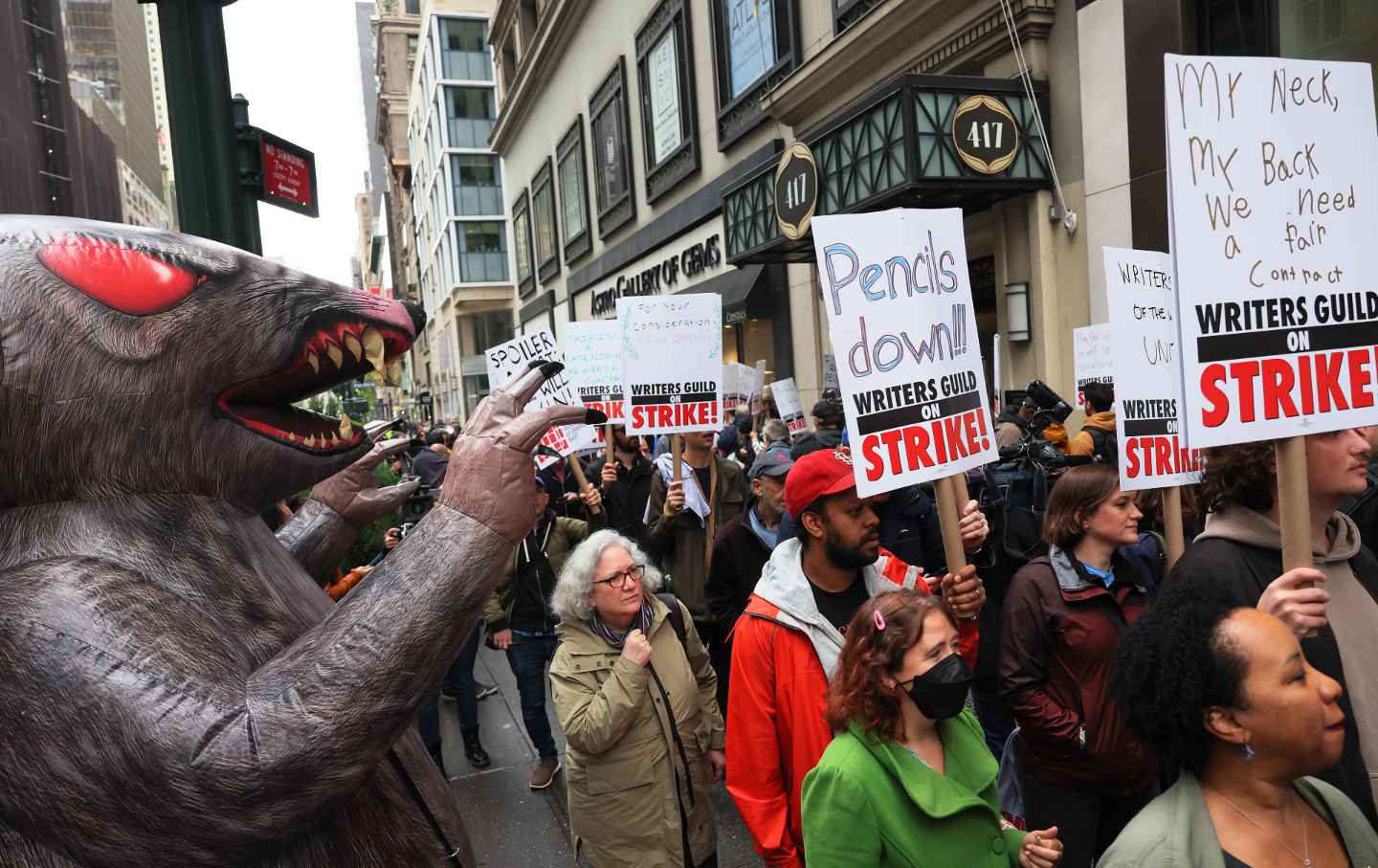 Members of the Writers Guild of America East on the picket line outside of the Peacock NewFront on May 2, 2023, in New York City.