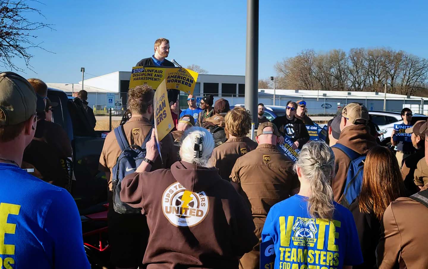 Tanner Fischer speaks in front of UPS workers in Iowa.
