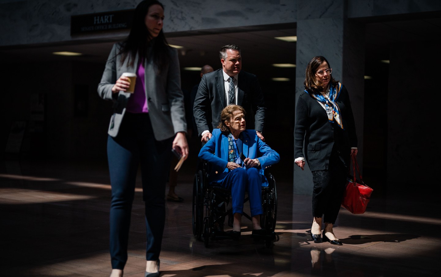 Sen. Dianne Feinstein departs a Senate Judiciary Business Meeting.