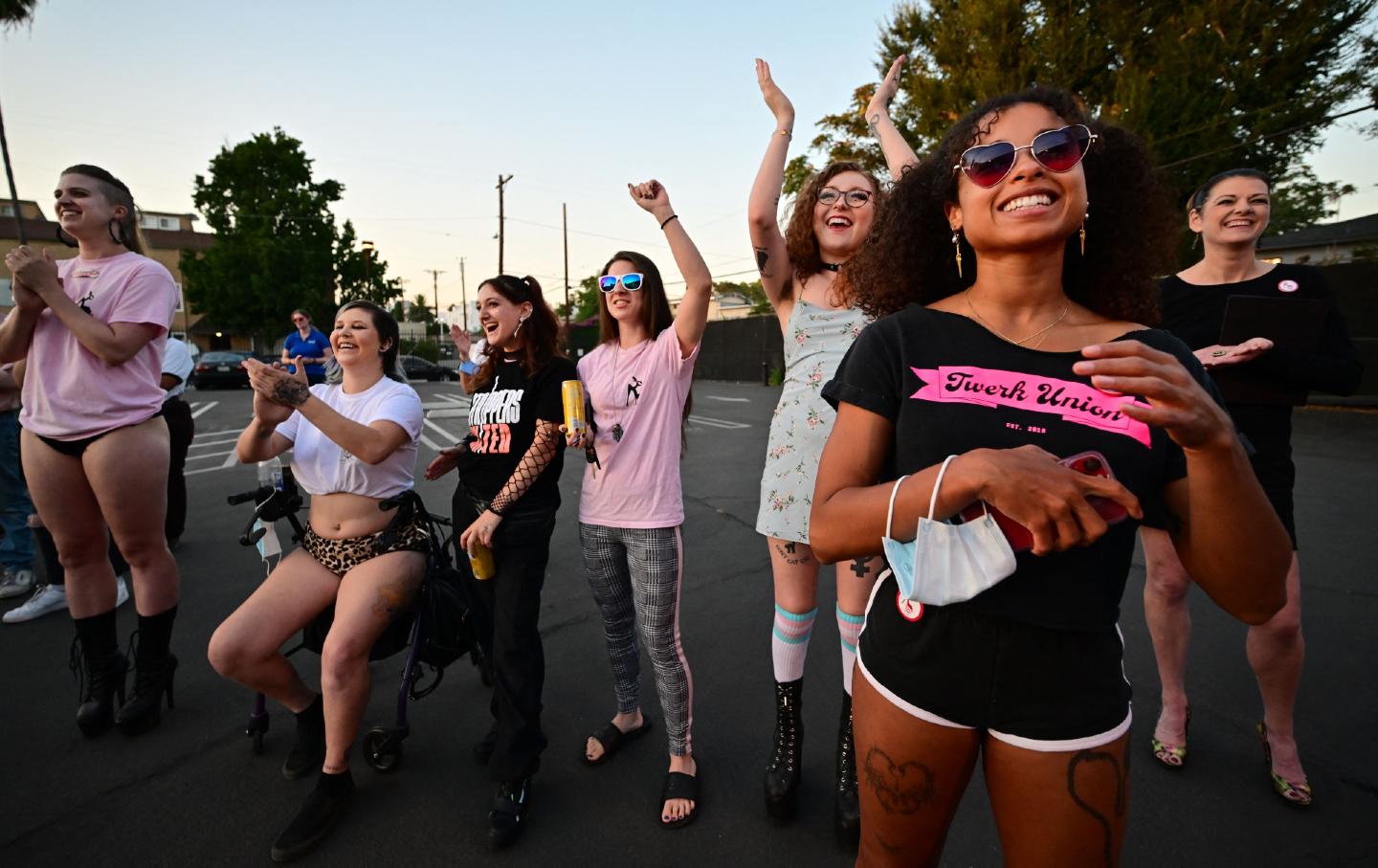 Unionizing strippers cheering at rally