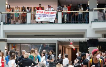 Protesters gather in the atrium of Atlanta City Hall to protest Cop City on Monday, June 5, 2023.