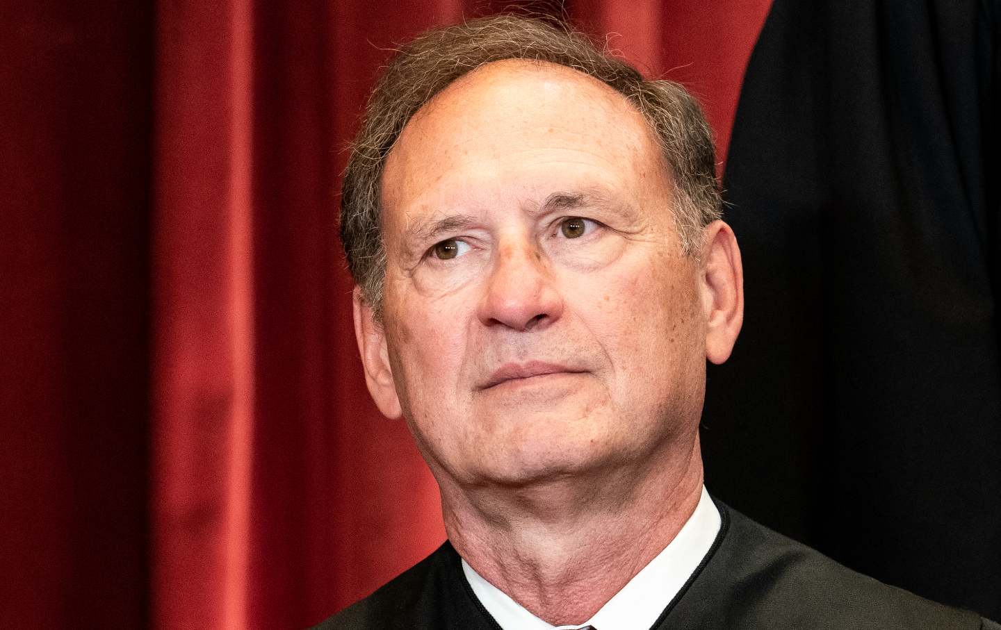 WASHINGTON, DC - APRIL 23: Associate Justice Samuel Alito sits during a group photo of the Justices at the Supreme Court in Washington, DC on April 23, 2021. (Photo by Erin Schaff-Pool/Getty Images)