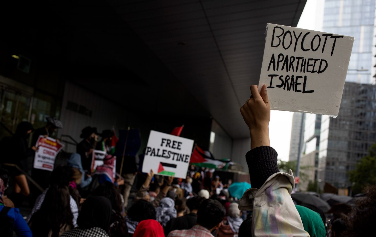 CUNY students hold a rally to protest the Israeli occupation of Palestine and demand that the university system divest from Israel, May 28, 2021 at John Jay College in New York City.