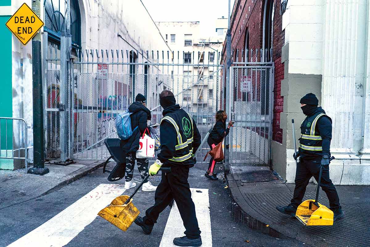 Urban Alchemy crews tidy up a street in San Francisco’s Tenderloin neighborhood.