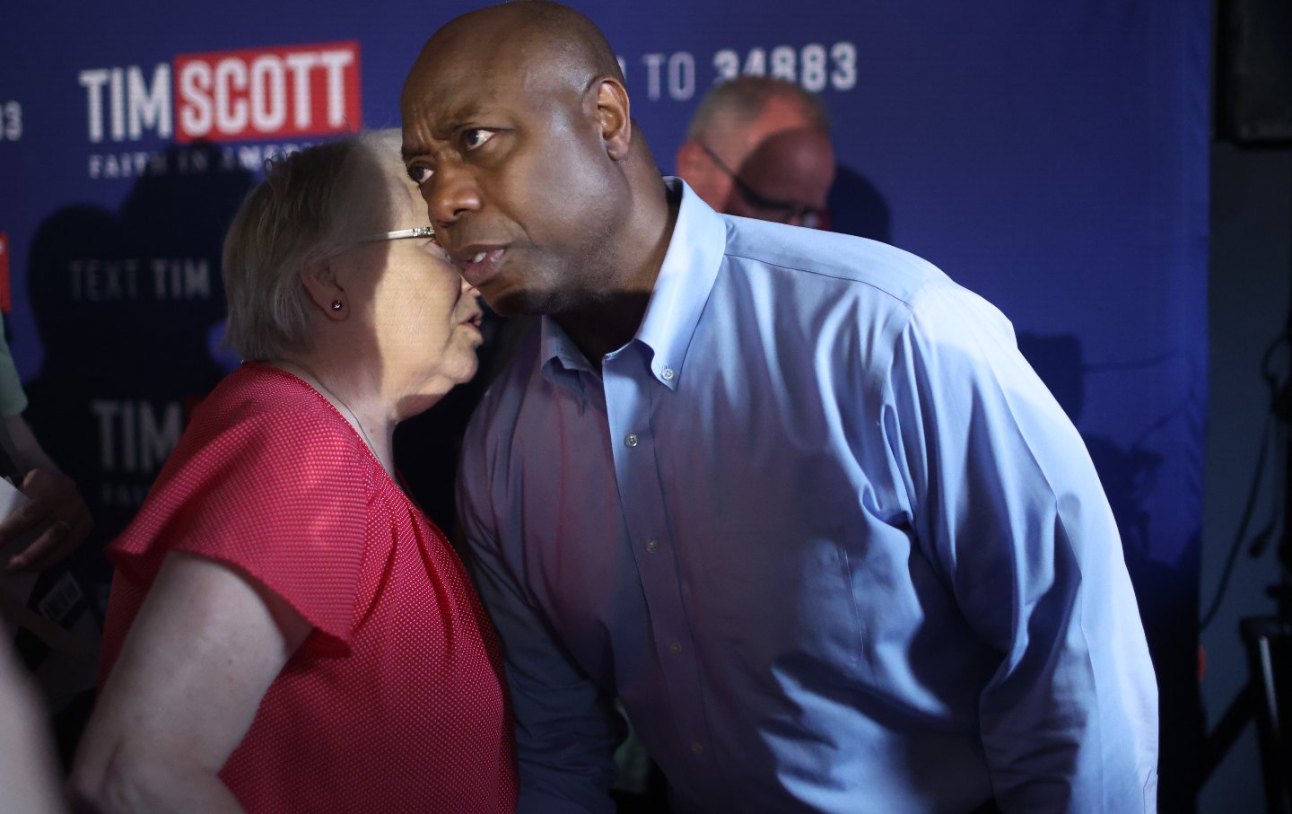 Republican presidential candidate Senator Tim Scott (R-S.C.) greets guests