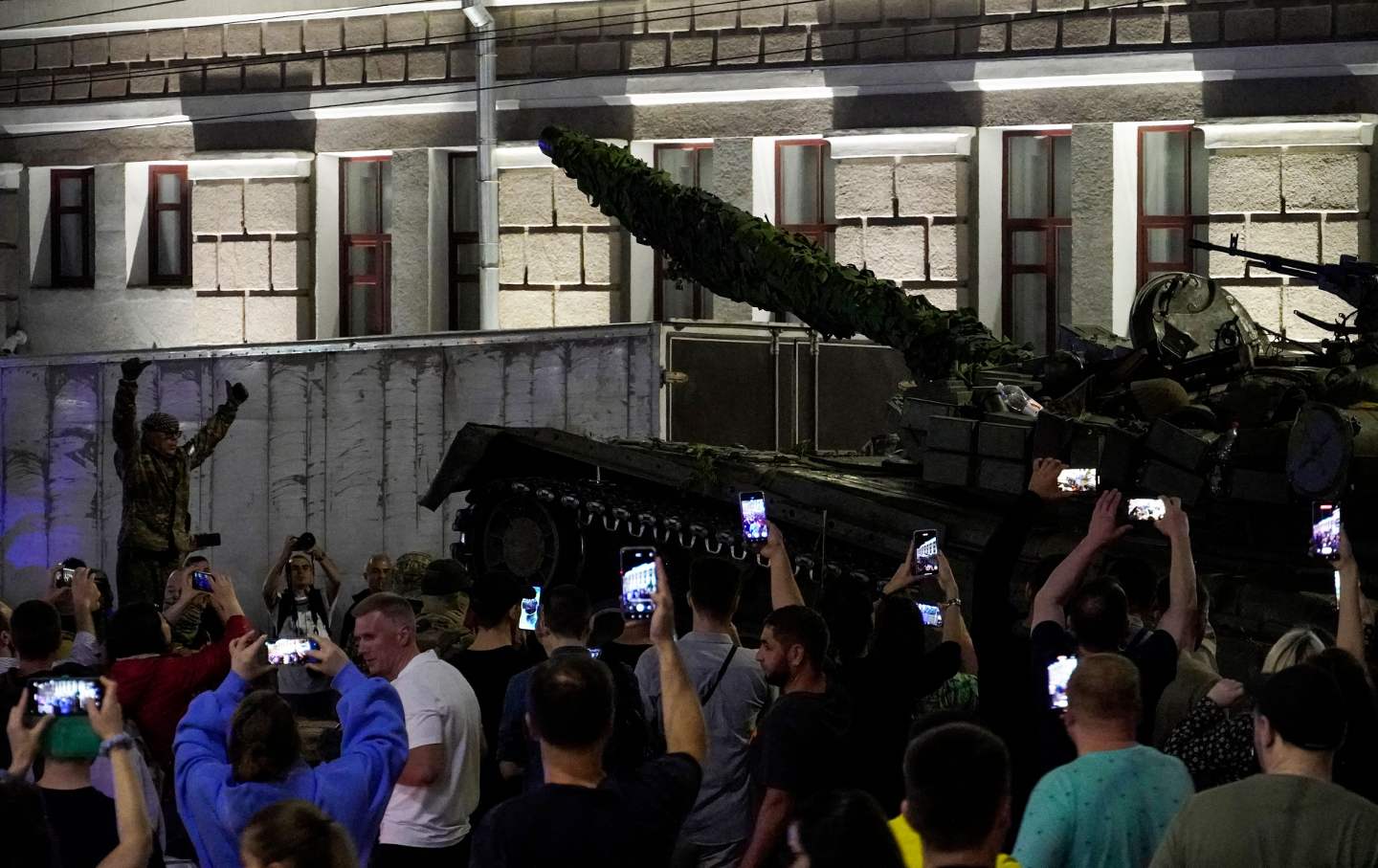 Members of the Wagner group prepare to pull out from the headquarters of the Southern Military District to return to their base in Rostov-on-Don late on June 24, 2023.