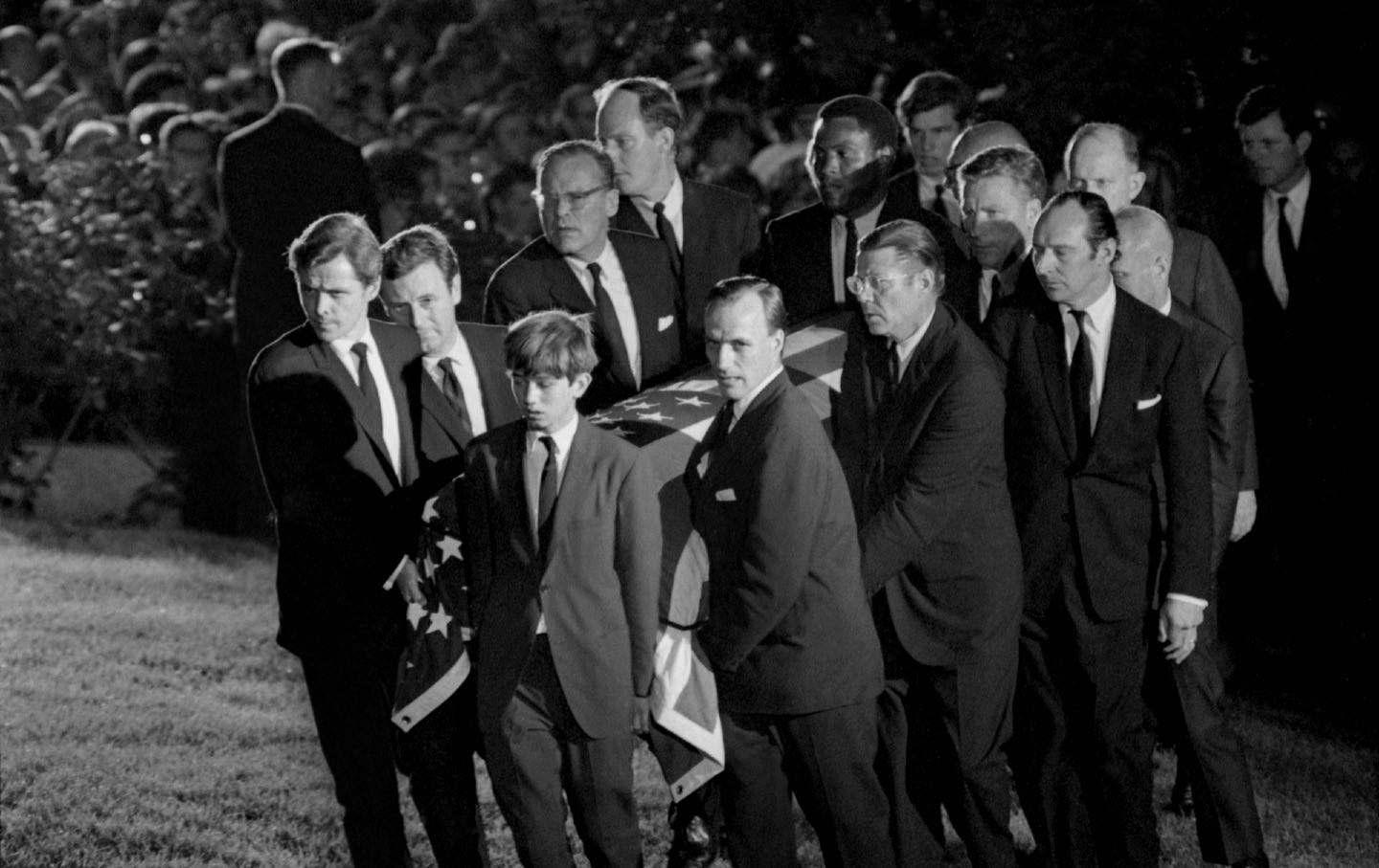 Black and white photo of pallbearers carrying the coffin of Robert Kennedy