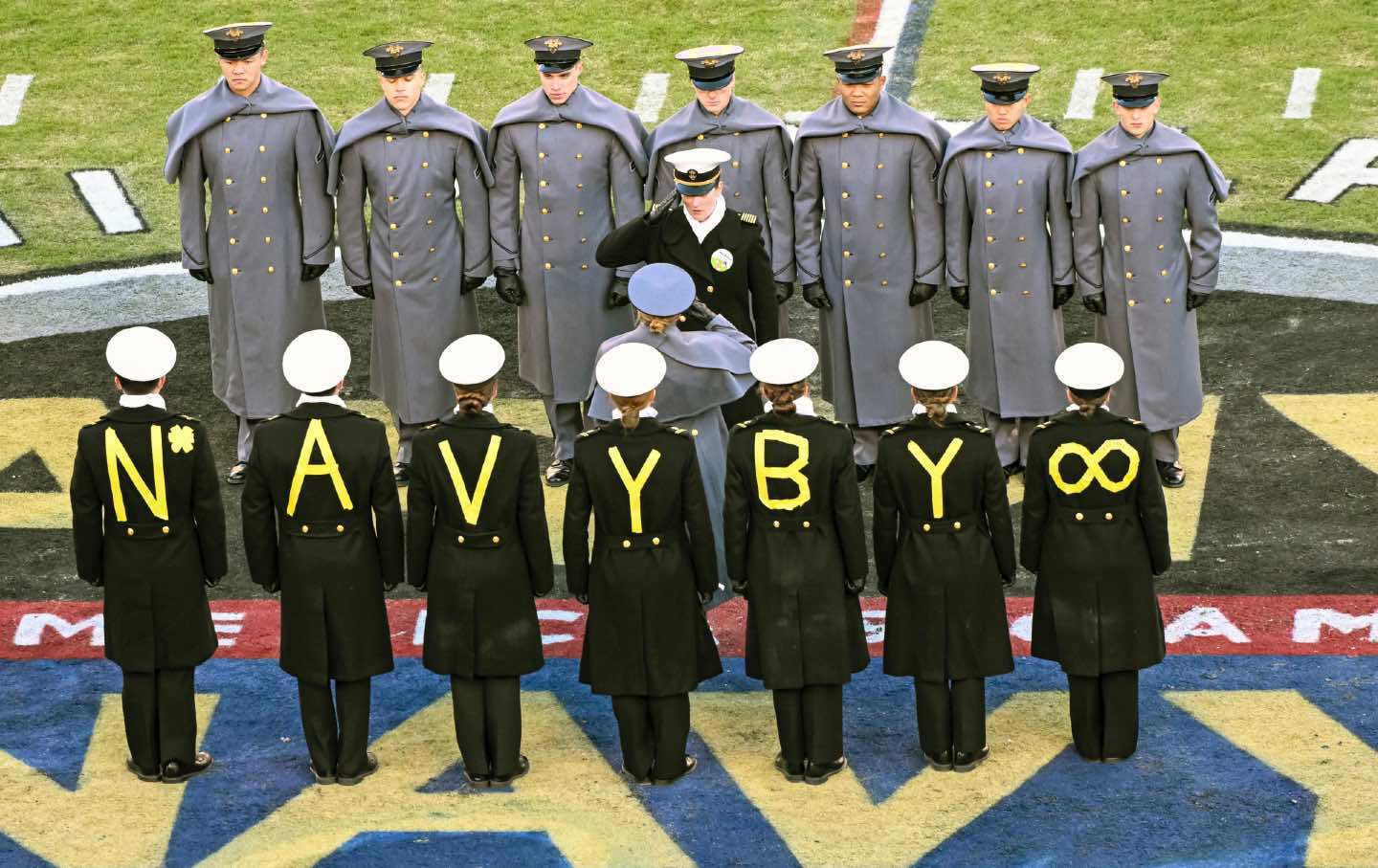 navy midshipmen stand on field prior to army navy game in Philadelphia