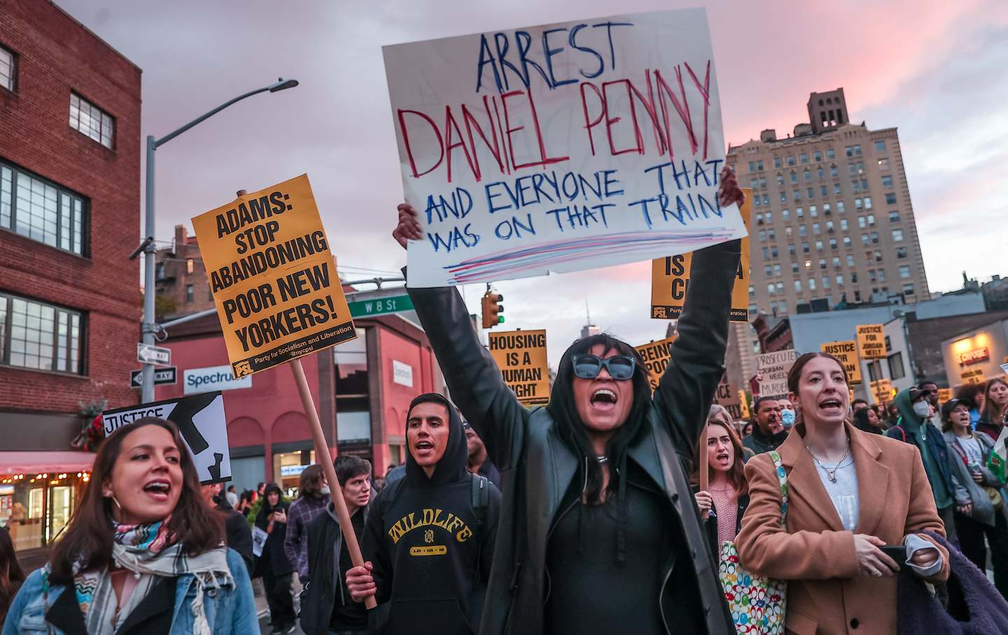 Hundreds of demonstrators hold banners in Washington Square Park in New York City on May 5, 2023. Charges were called against the former US Marine who choked a homeless man, Jordan Neely, to death on the subway.