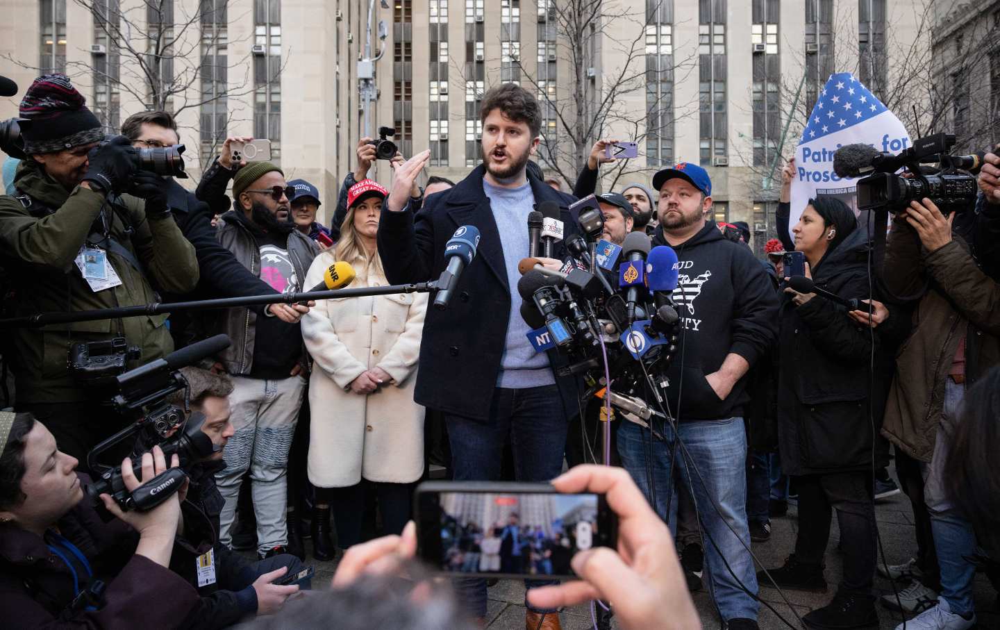 Gavin Wax, president of the New York Young Republican Club, speaks to members of the media during a rally outside the New York County Criminal Court in New York City, on Monday, March 20, 2023.