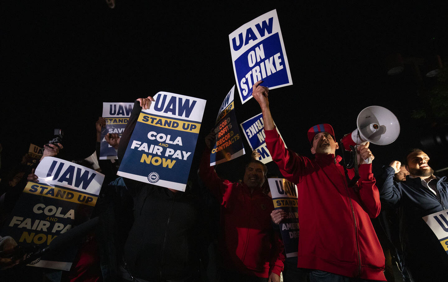 Supporters and workers cheer as United Auto Workers members go on strike at the Ford Michigan Assembly Plant on September 15, 2023, in Wayne, Mich.