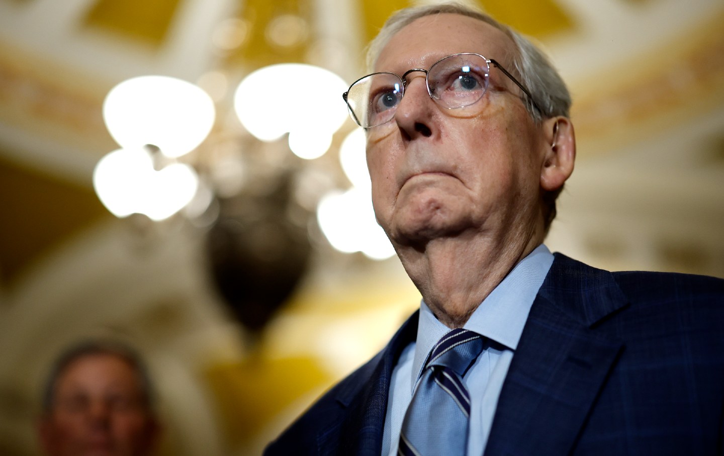 Senate minority leader Mitch McConnell (R-Ky.) listens to reporters' questions during a news conference at the US Capitol on September 12, 2023.