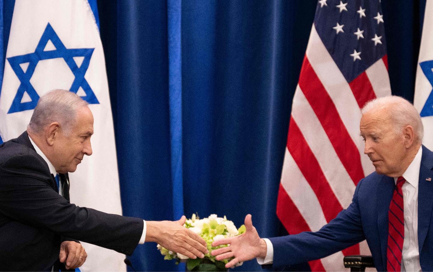 US President Joe Biden shakes hands with Israeli Prime Minister Benjamin Netanyahu as they meet at the 78th United Nations General Assembly in New York City on September 20.