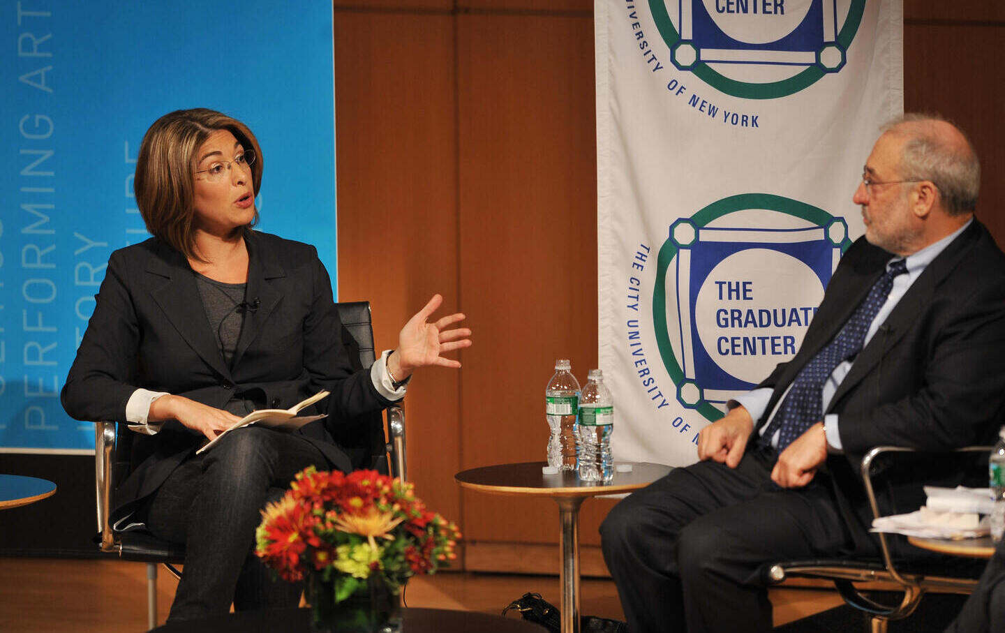 US journalist Naomi Klein (L), columnist for The Nation and The Guardian and the author of “The Shock Doctrine: The Rise of Disaster Capitalism,” speaks as Joseph Stiglitz, Nobel Prize–winning economist and University Professor at Columbia University, listens at a debate on Economic Power on October 20, 2008, during the Great Issues Forum at the Graduate Center of the City University of New York in New York.