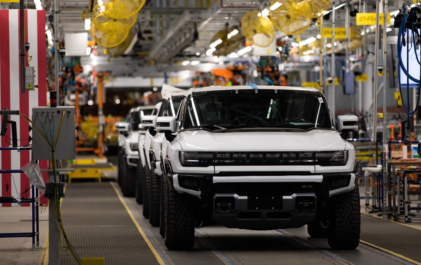 Electric vehicles on the production line at General Motors' Factory ZERO all-electric vehicle assembly plant in Detroit, Mich.