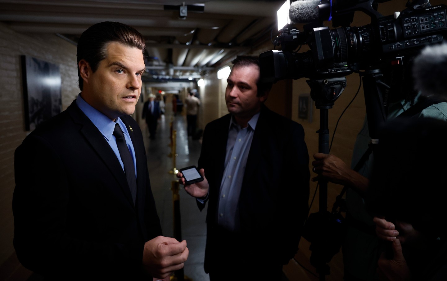 Representative Matt Gaetz (R-Fla.), a member of the right-wing House Freedom Caucus, talks to reporters on his way to a House Republican caucus meeting at the US Capitol on September 19, 2023, in Washington, DC. Gaetz opposes a deal between factions of House Republicans to pass a stopgap spending bill and avoid a government shutdown, which will be tested Tuesday with a procedural vote.