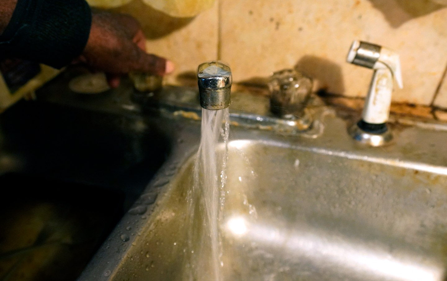 photo of a sink with water that is not safe for drinking