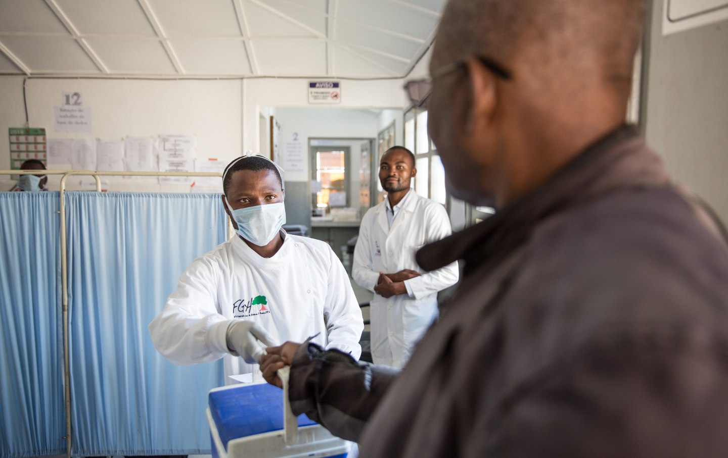 A courier collects HIV viral load samples at a rural health clinic in Zambezia. With funding from the US President's Emergency Plan for AIDS Relief (PEPFAR), CDC-Mozambique supports an efficient system to transport samples collected from the periphery to the testing laboratory.