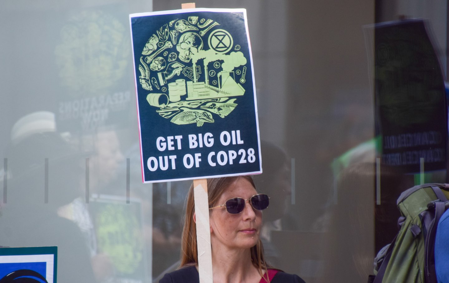 get big oil out of cop28! poster/ protester extinction rebellion