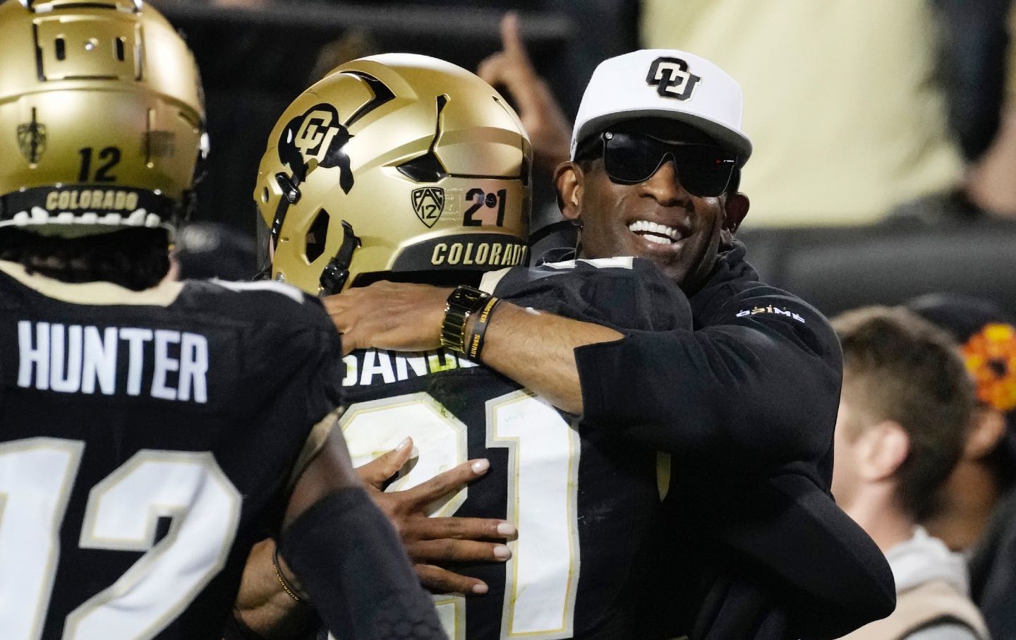 deion sanders hugs son college football game colorado