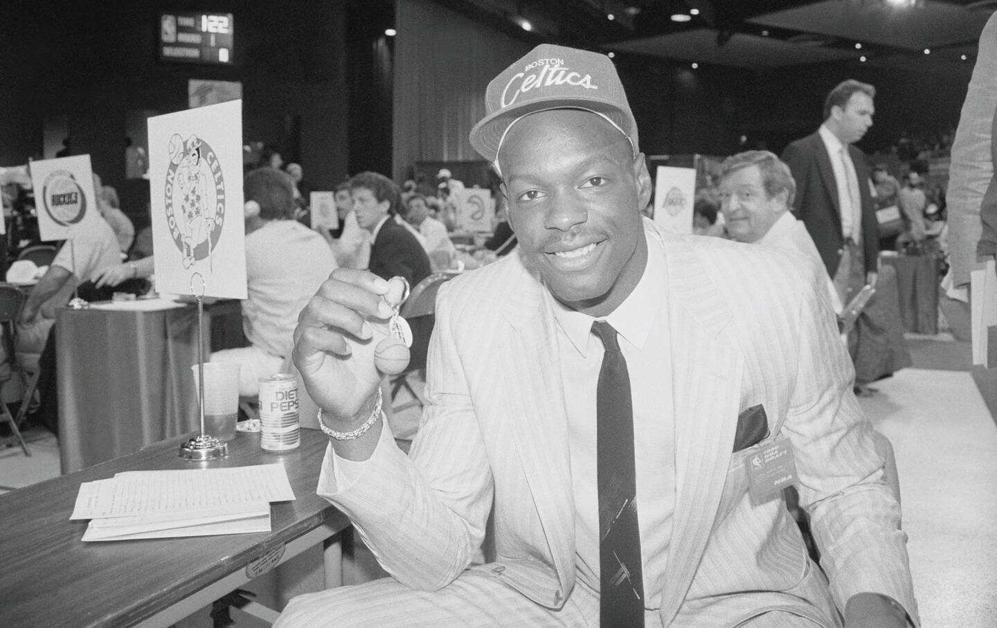 Maryland forward Len Bias twirling a basketball keychain.