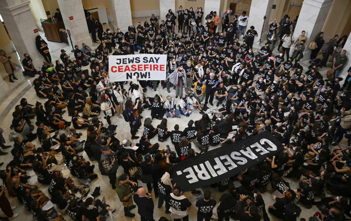 Police officers take a protester into custody as Jewish activists stage pro-Palestinian demonstration at United States Capitol building in Washington D.C., on October 18, 2023.